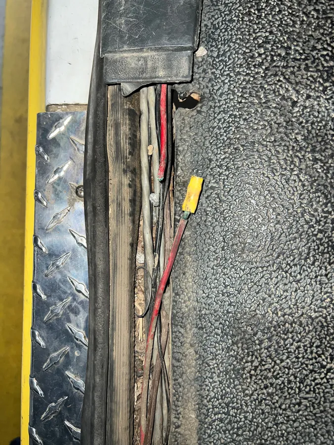A corroded wiring harness located and repaired during an electrical diagnosis.